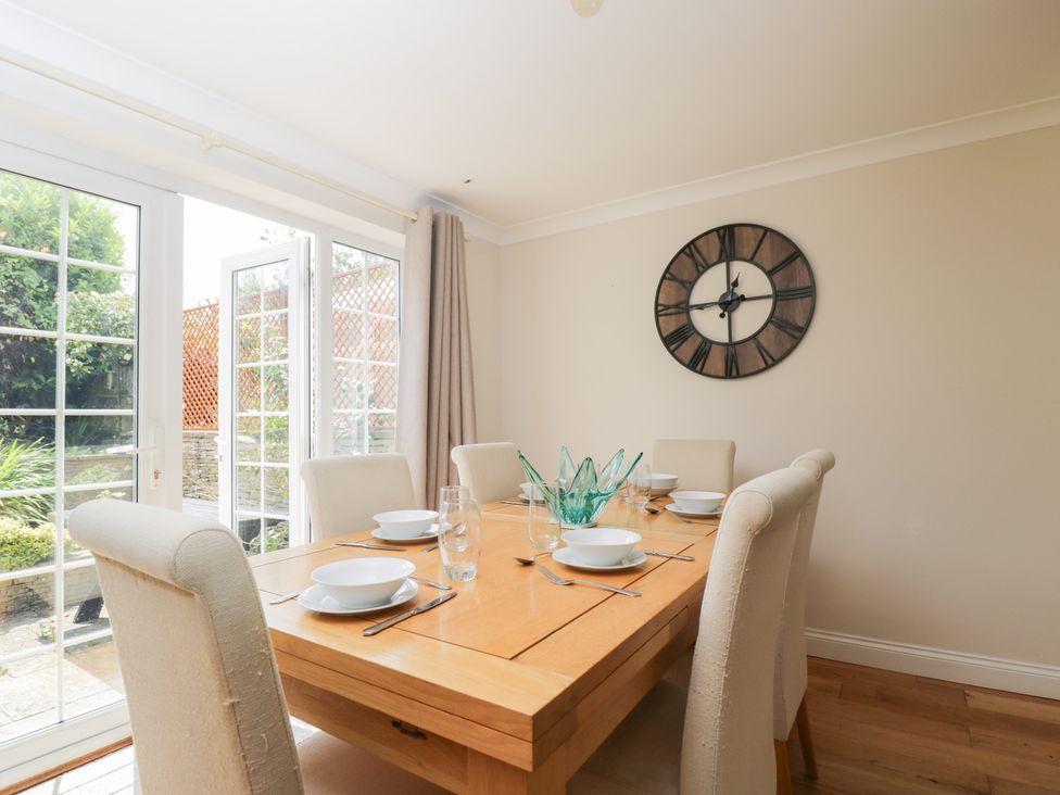 A dining room with a table set for six at Lorien in Fifield