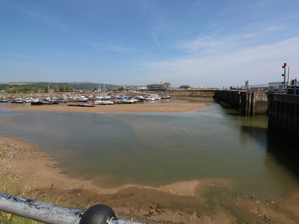 A harbour with boats and water at Graig Goch in Burry Port