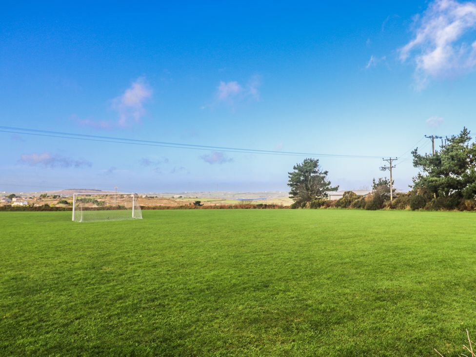 A soccer field with a goal and trees at Tataramoa near Falmouth