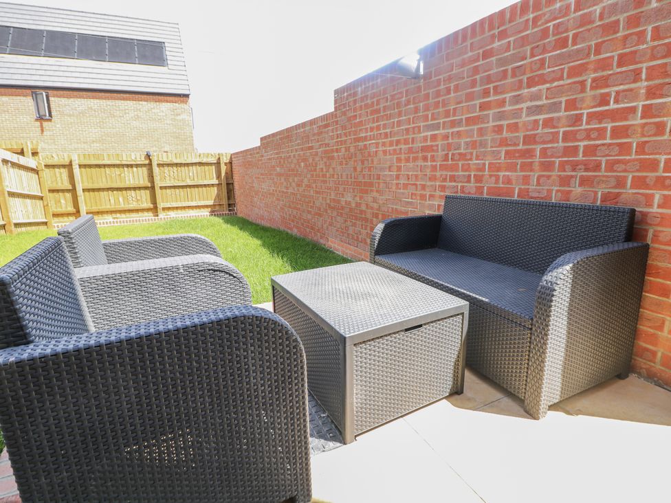 Outdoor seating area with a sofa and chairs at Peak Avenue Retreat Wingerworth near Chesterfield