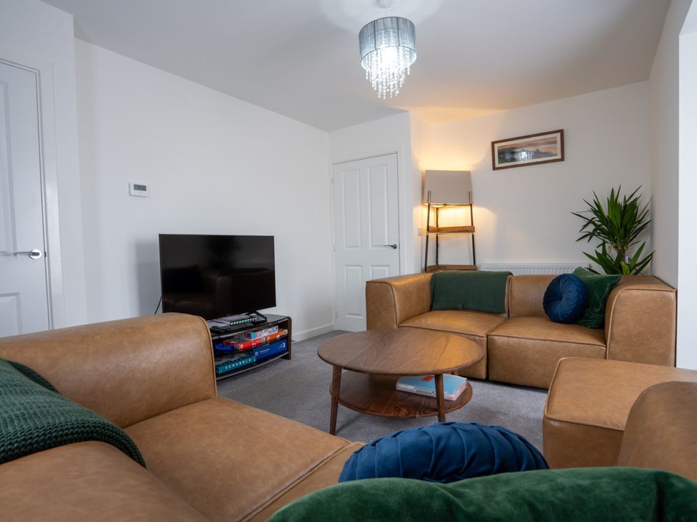 A living room with a coffee table and sofa at Peak Avenue Retreat in Wingerworth near Chesterfield
