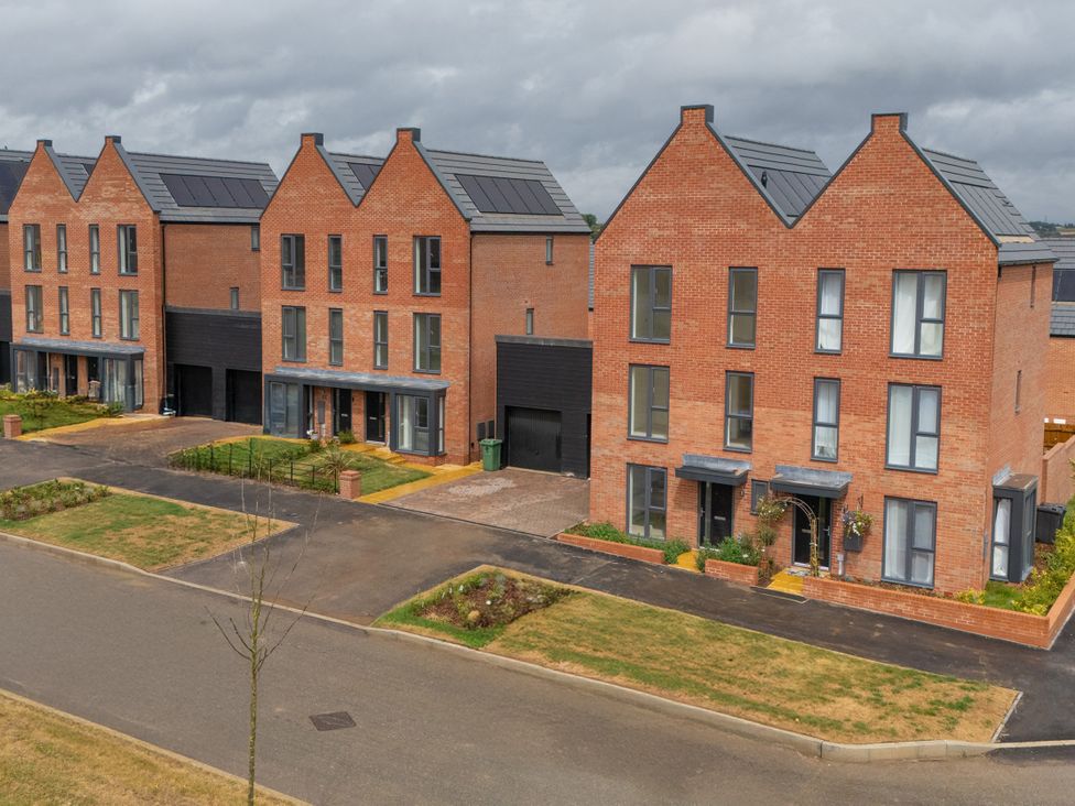 A row of modern houses with solar panels at Peak Avenue Retreat in Wingerworth near Chesterfield