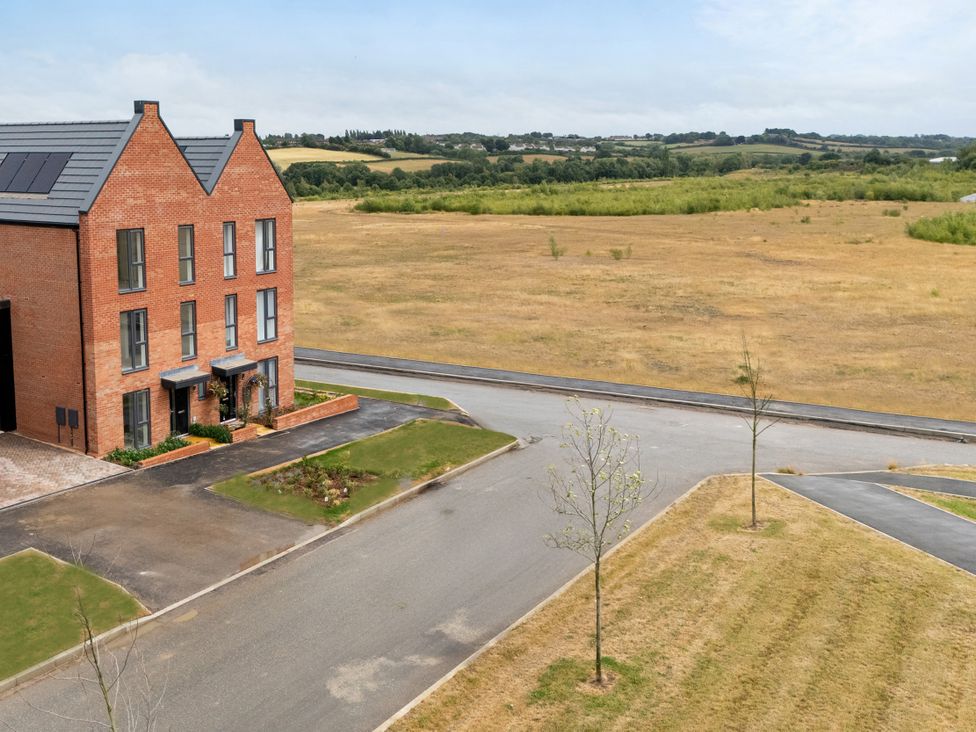 A house with a garden and pathway at Peak Avenue Retreat in Wingerworth near Chesterfield