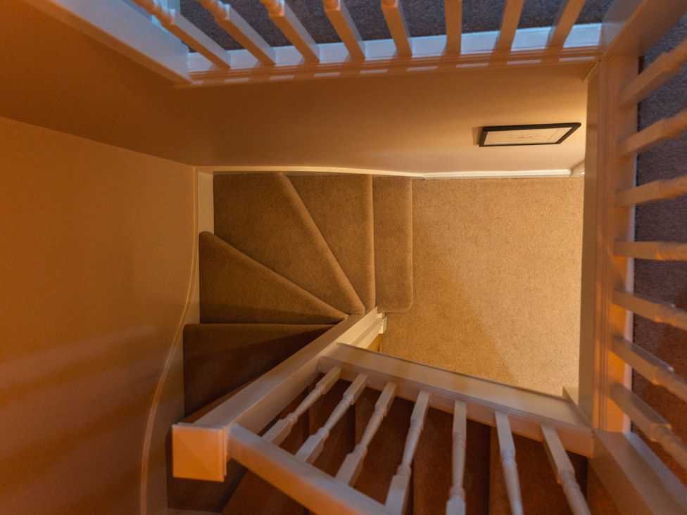 A staircase in a stairwell at Willow Garth in Roecliffe near Boroughbridge