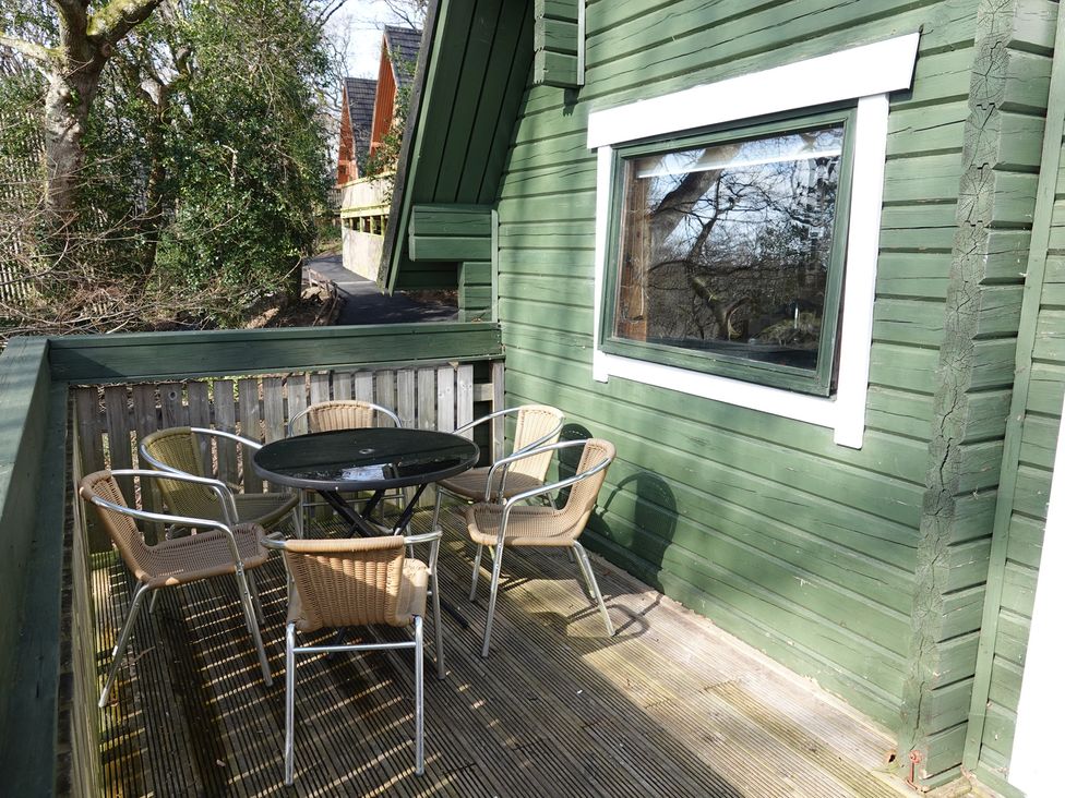 An outdoor area with a table and chairs at Tor View Finlakes Holiday Park near Chudleigh