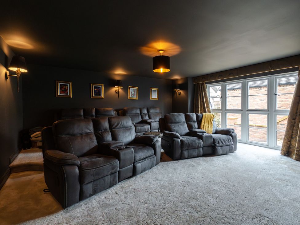 A home cinema with recliner chairs at 30 High Lane East, Ilkeston