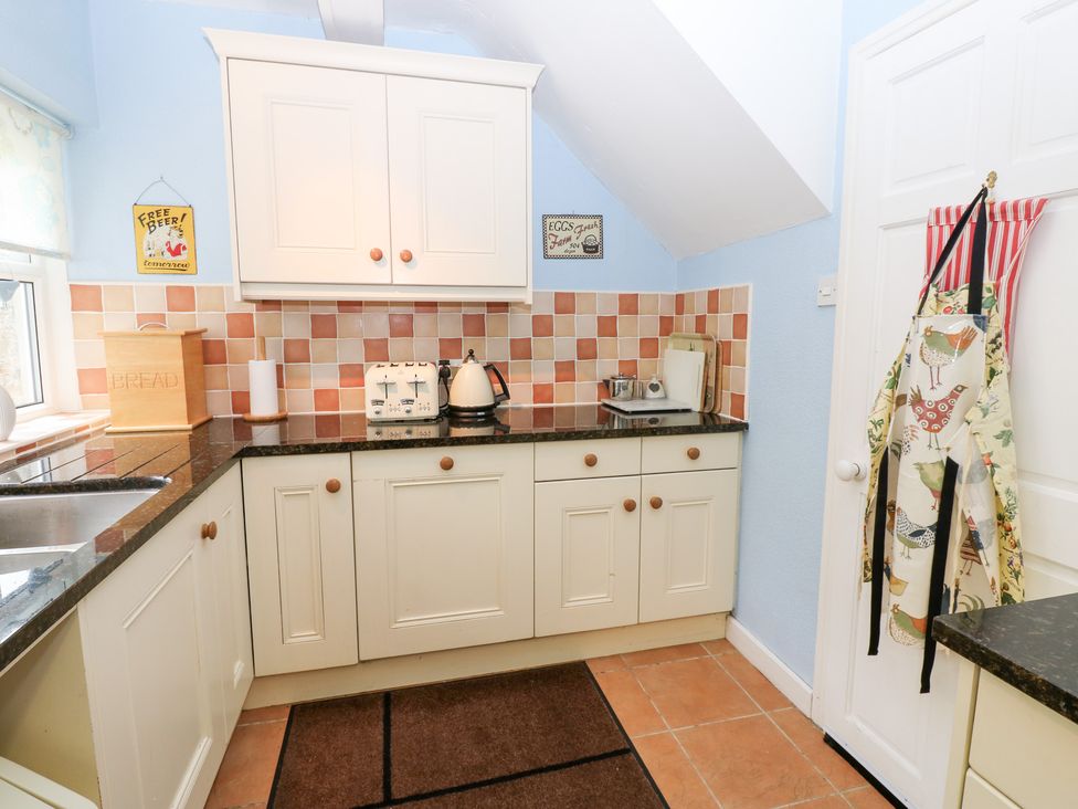 A kitchen with a sink and countertop at South View, Gunnerside