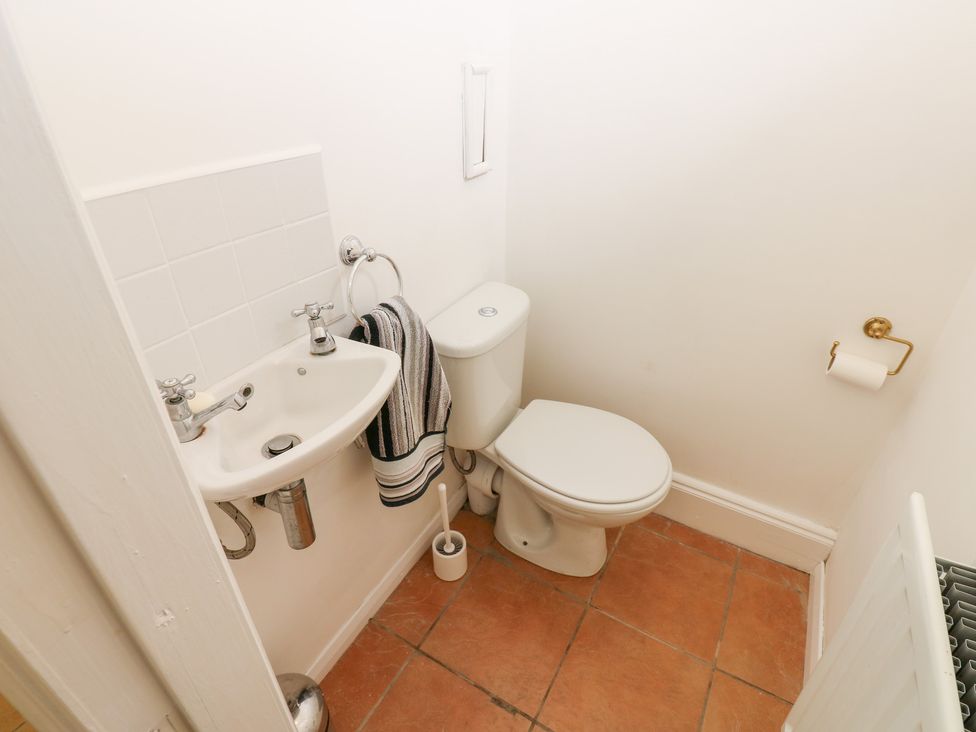 A bathroom with a sink and toilet at South View, Gunnerside near Reeth