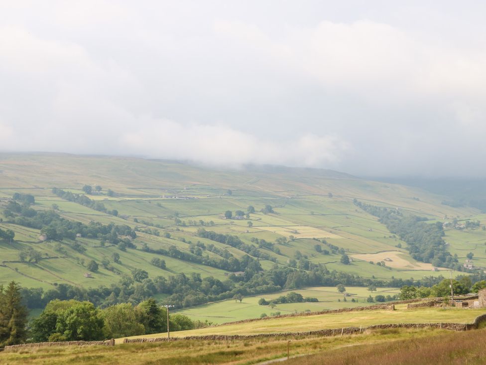 A scenic view of fields and hills at South View, Gunnerside near Reeth