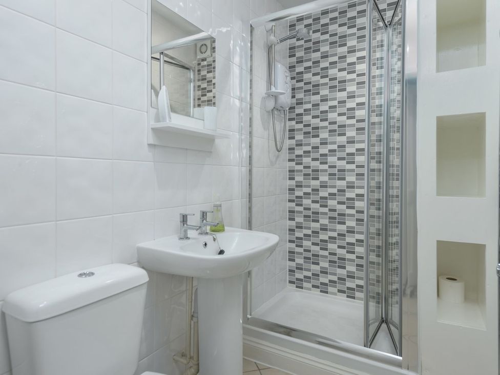 A bathroom with a sink and shower at The Forge in Morpeth