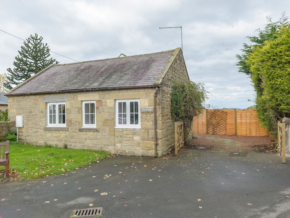 A cottage with windows and a door at The Forge in Morpeth