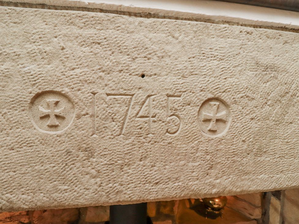 A stone with inscriptions from 1745 at Peary House in Alnwick