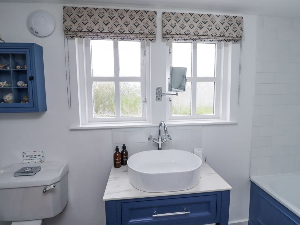 A bathroom with a sink and toilet at Peary House in Alnwick