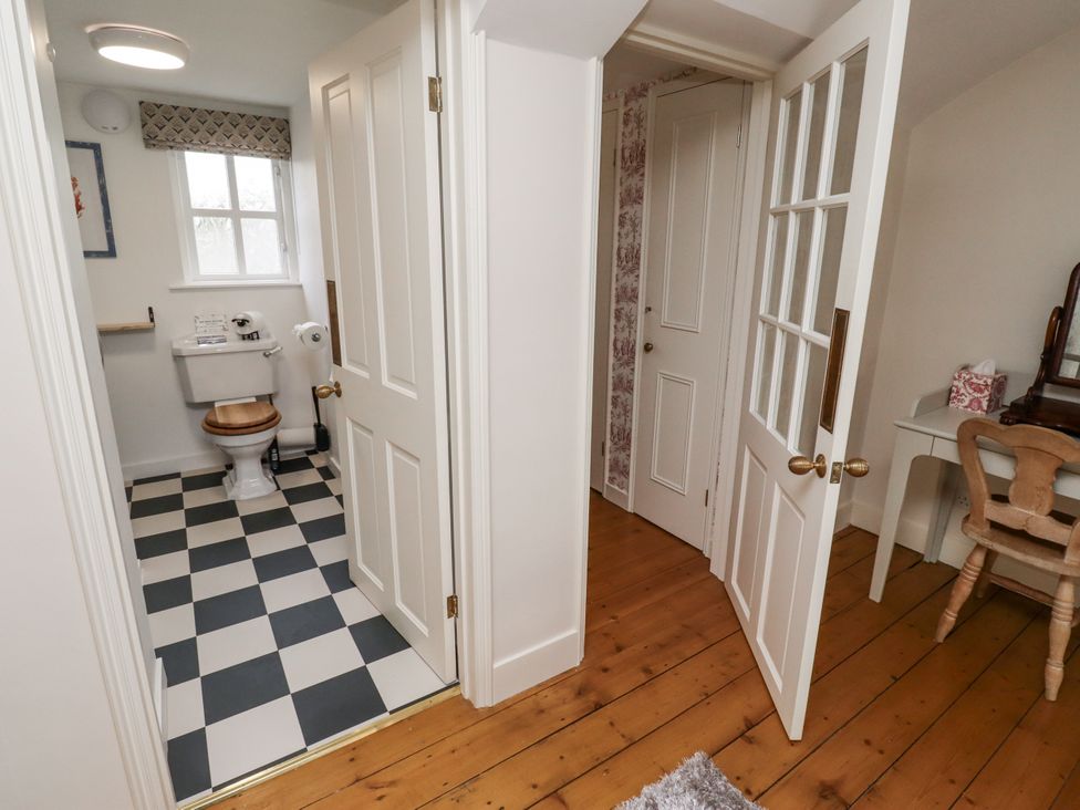 A bathroom with a toilet and sink at Peary House in Alnwick