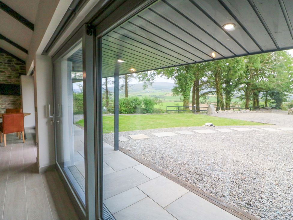 A view from inside showing a sliding glass door and outdoor area at The Stall near Kealkill, County Cork