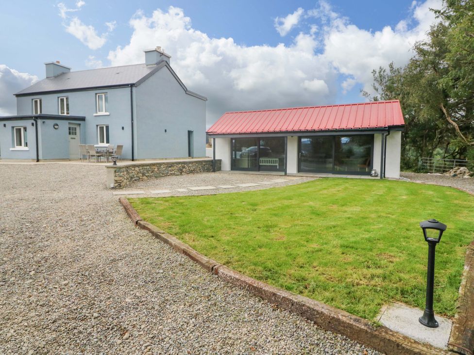 A house with a red roof and lawn area at The Stall near Kealkill, County Cork