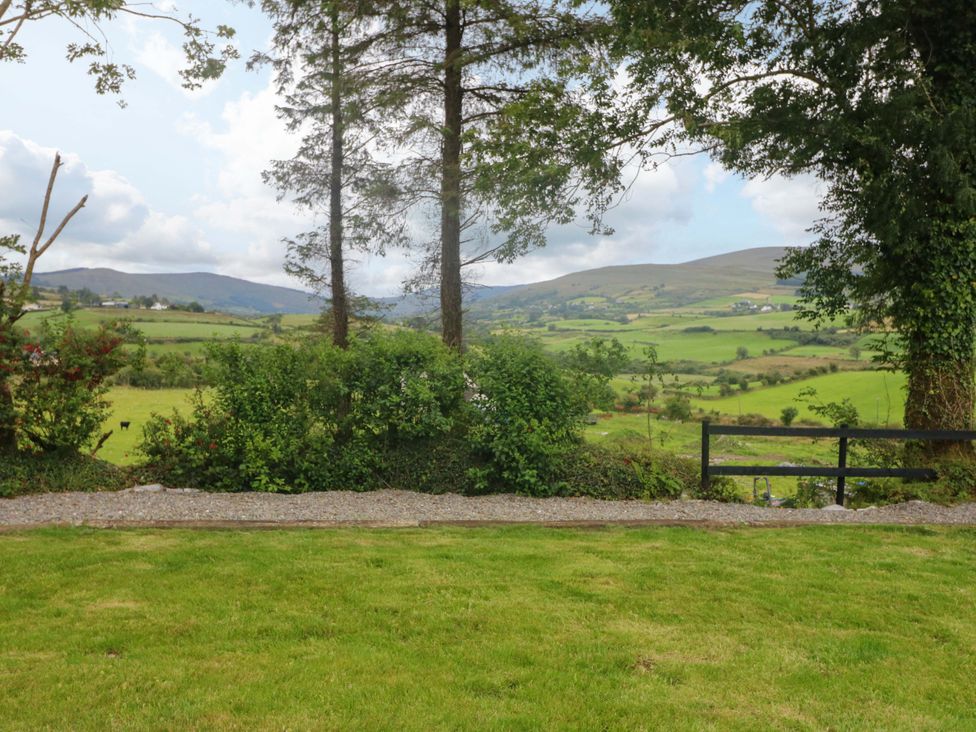 A view of hills and trees with a path at The Stall near Kealkill, County Cork