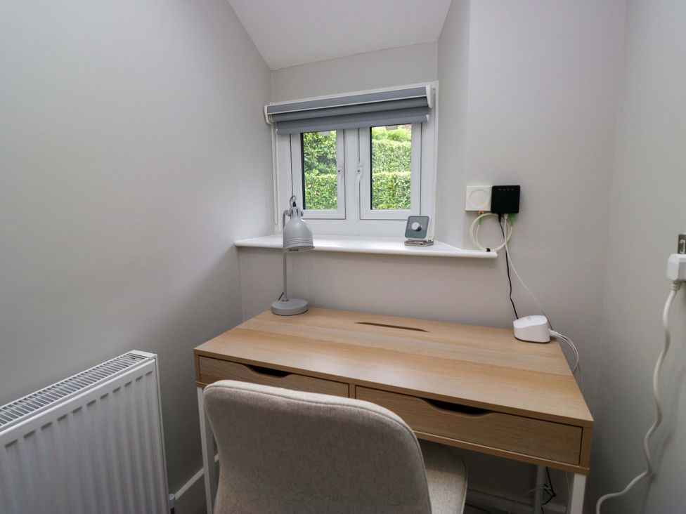 An office with a desk and chair at Dove Cottage Ambleside