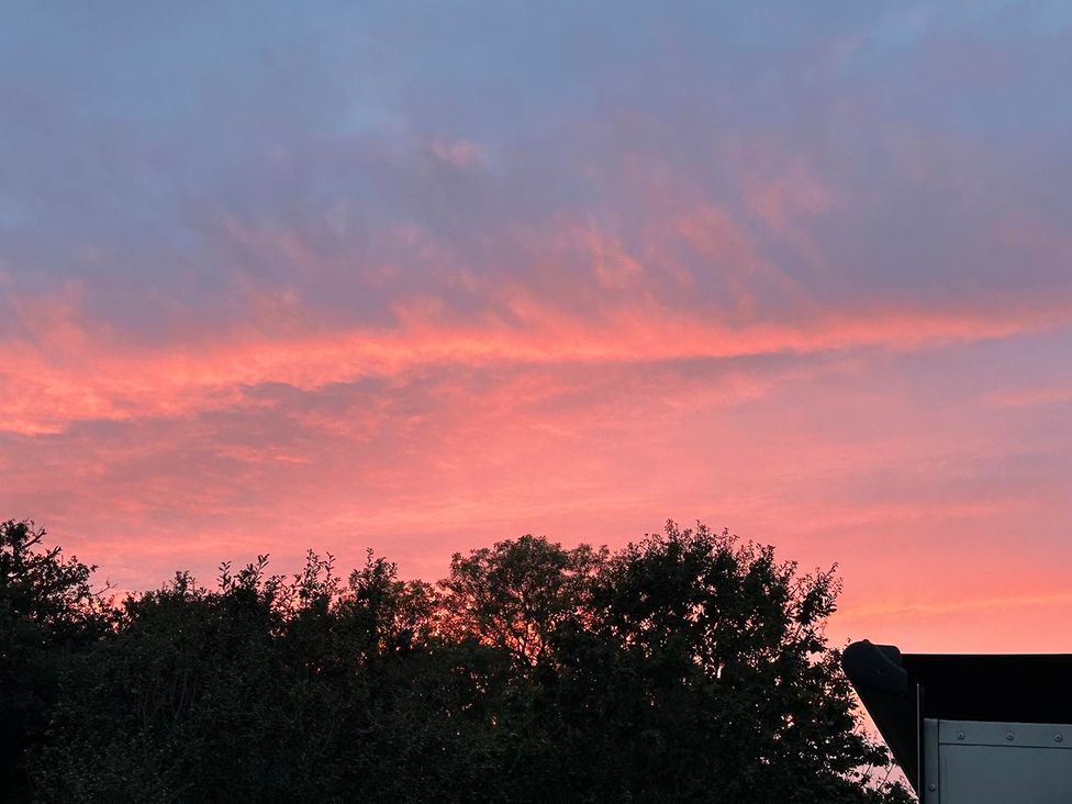 A scenic view of the sky during sunset at Buzzards Lodge near Victoria