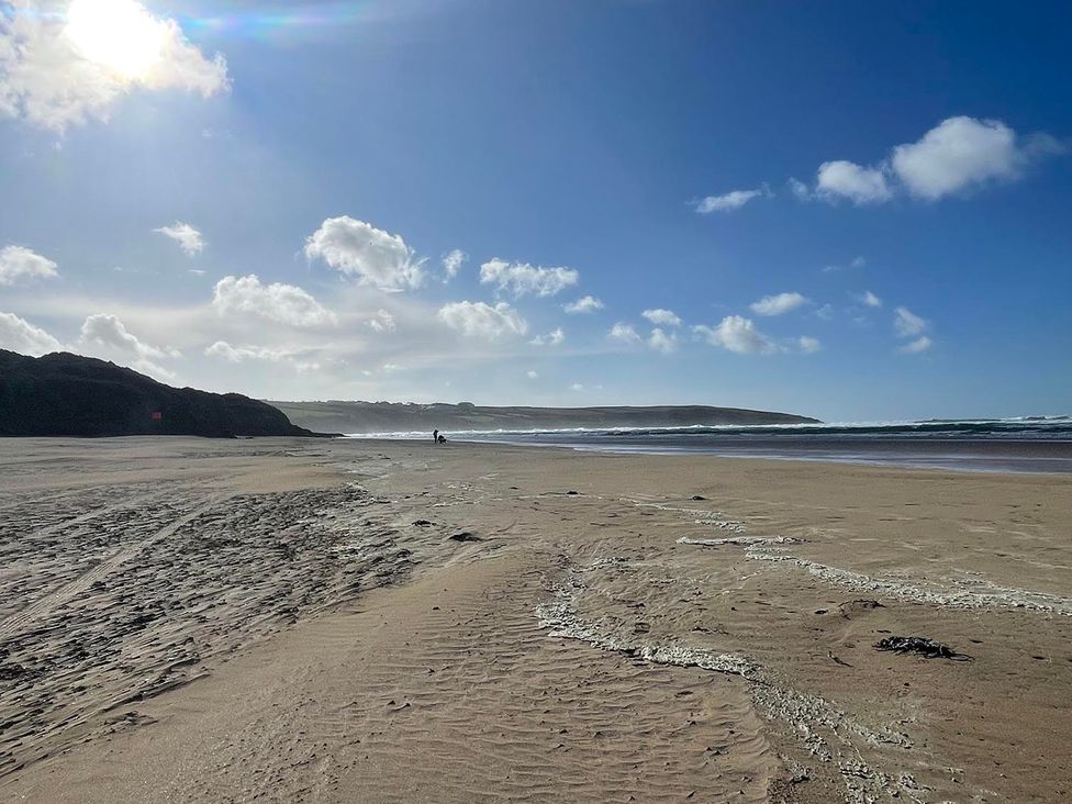 A beach with sand and ocean at Buzzards Lodge near Victoria