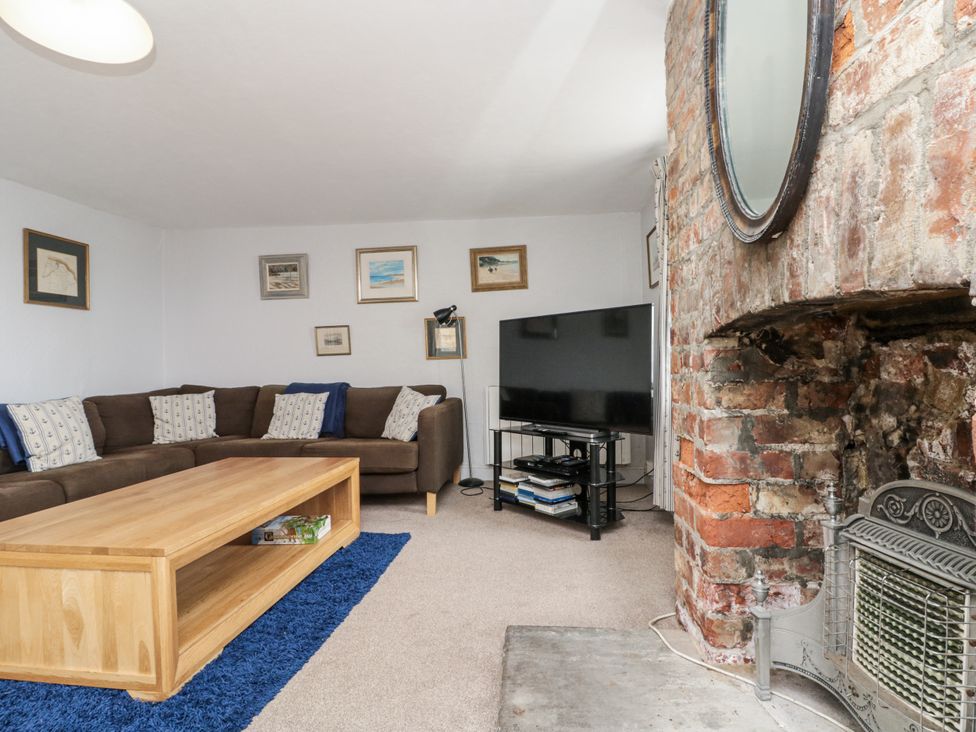 A living room with a sofa and coffee table at Shelstone in Whitby