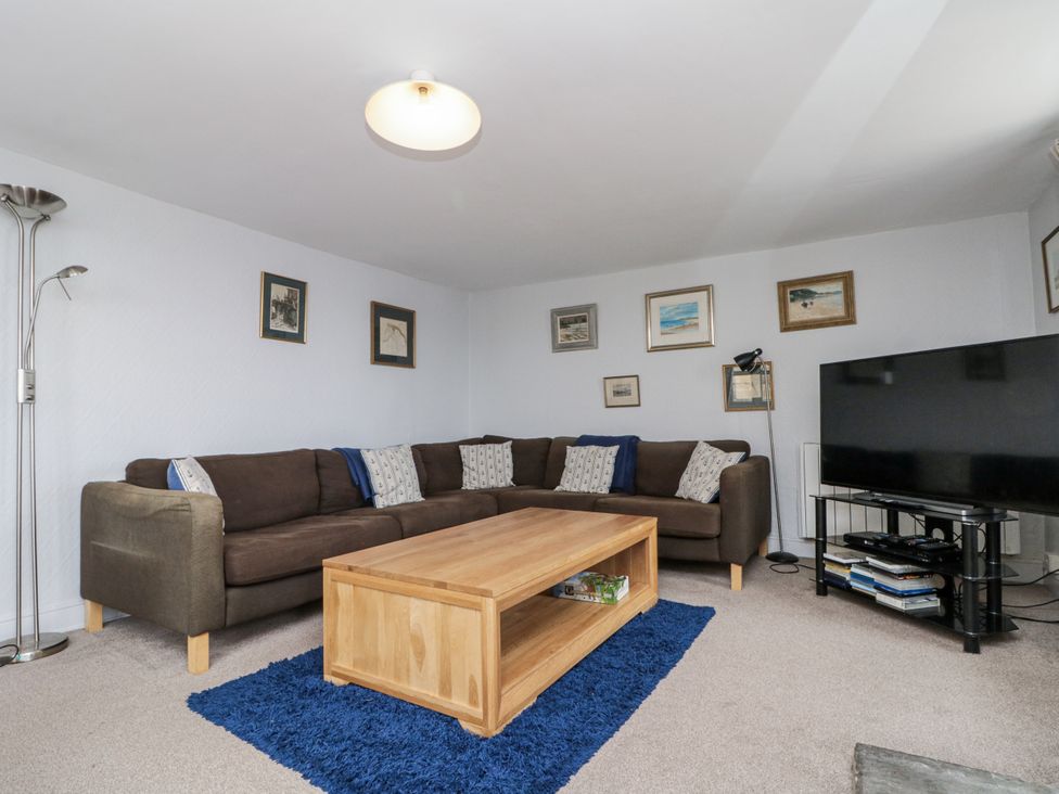 A living room with a sofa and a table at Shelstone in Whitby