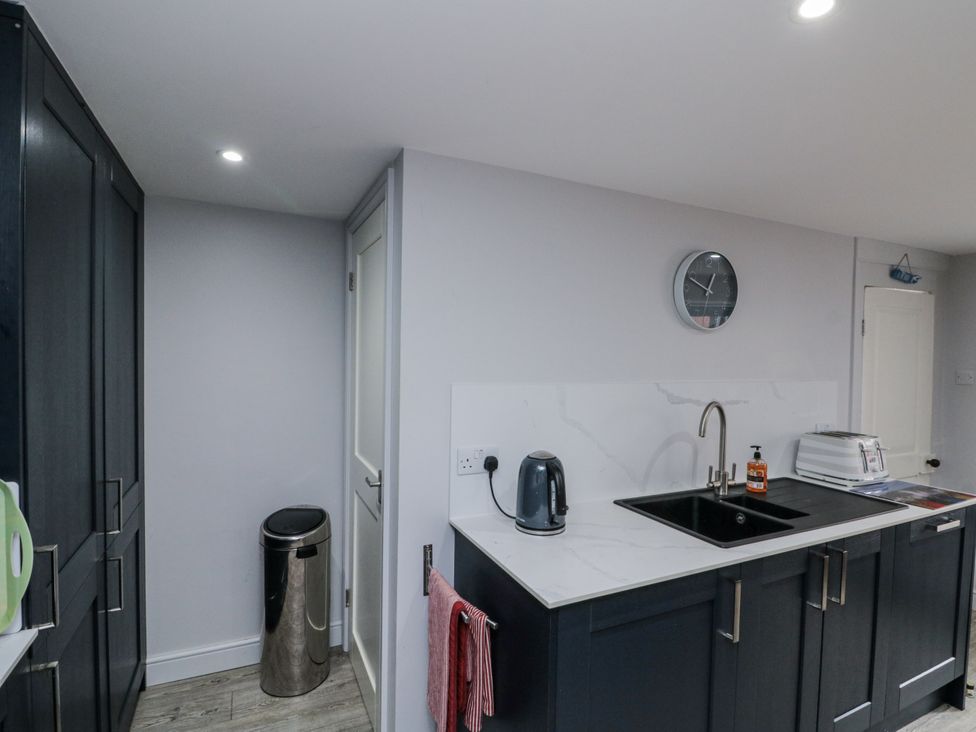 A kitchen with a sink and kettle at Shelstone in Whitby