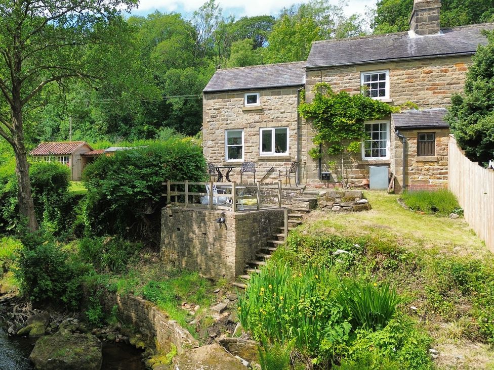 A house with an outdoor area and steps at Whinstone Cottage Esk Valley near Grosmont