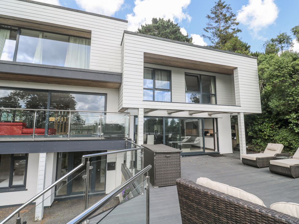 An outdoor area with a house and balcony at Treliance in Truro