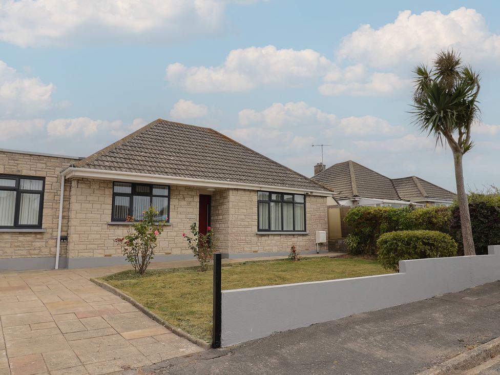 A bungalow with a front yard at 7 Cedar Drive Preston