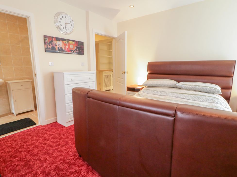A bedroom with a bed and drawer unit at 3 Warke Place Castlerock