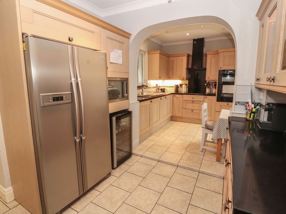 A kitchen with appliances and cabinets at High Cross in Keswick