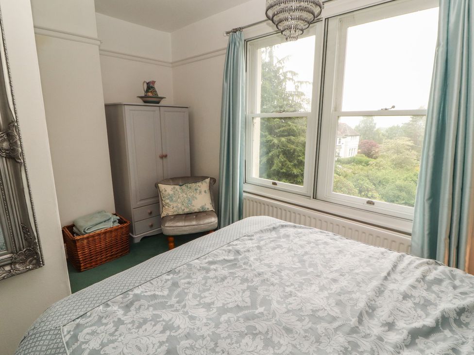 A bedroom with a bed and a window at High Cross in Keswick