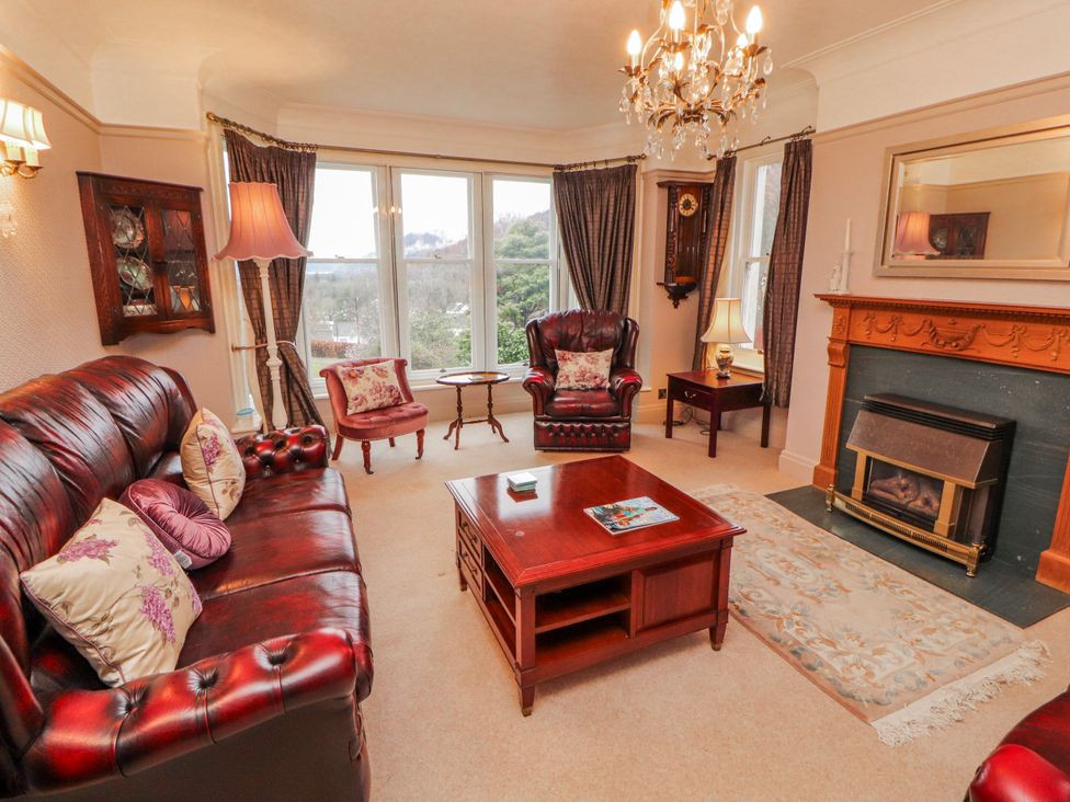 A living room with a coffee table and sofa at High Cross in Keswick