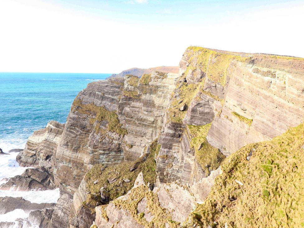 A view of cliffs overlooking the ocean at O'Conells in Portmagee