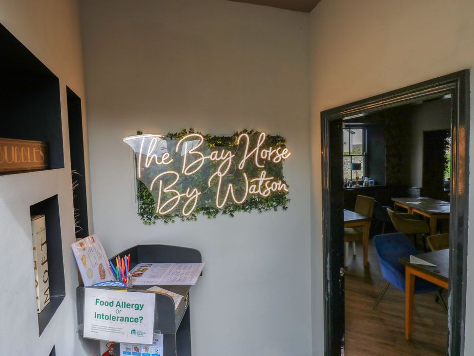 An entrance area with a sign at The Bay Horse By Watson in Brandon, County Durham