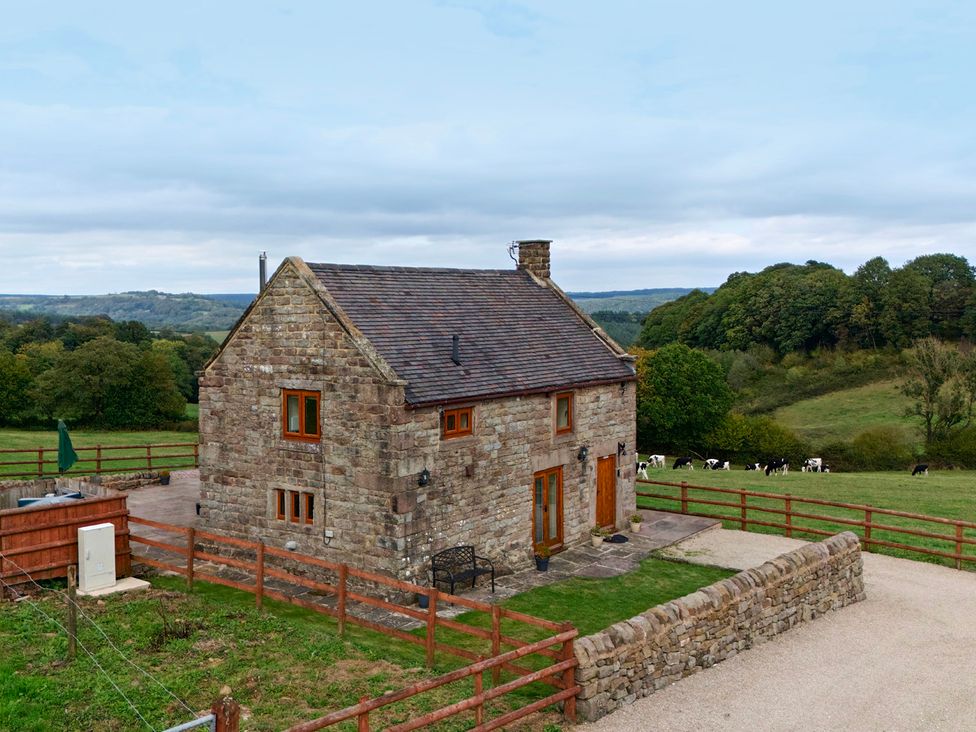 A house with a pathway and fence at Lane Head Cottage Alderwasley near Wirksworth
