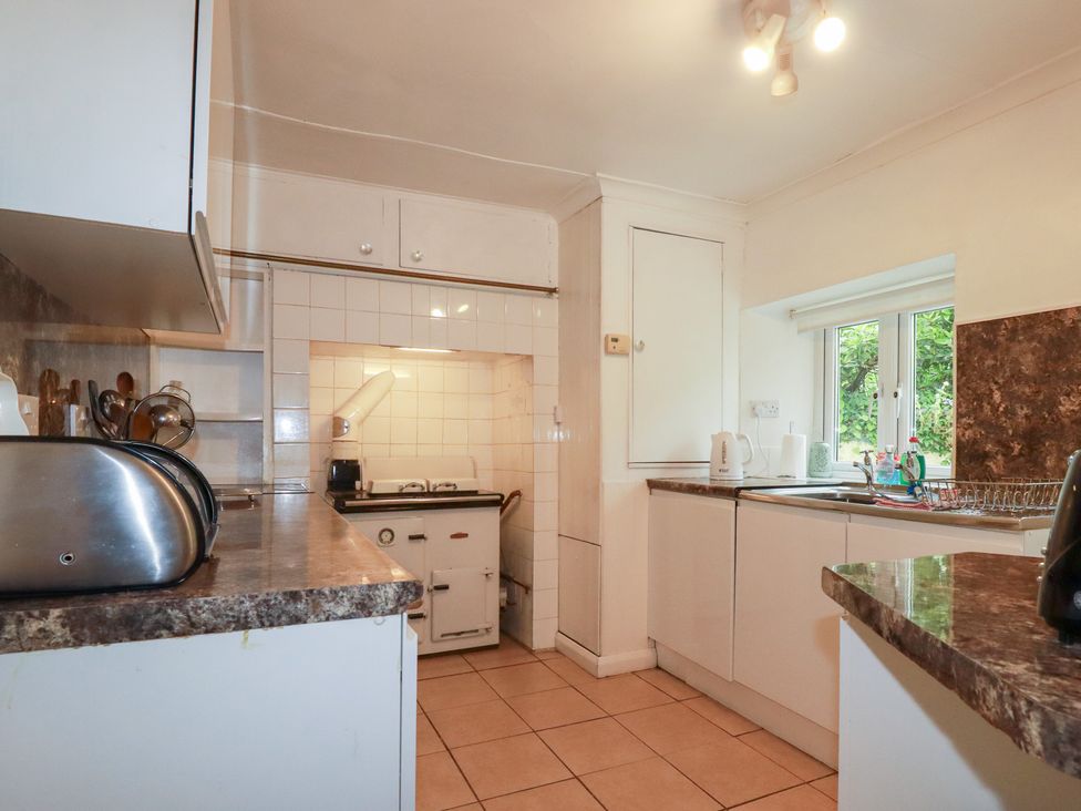 A kitchen with a toaster and kettle at Nanvivian in Feock near Truro