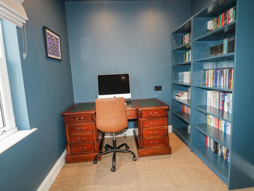 An office with a desk and computer at Cloneytrace Mines Broughshane