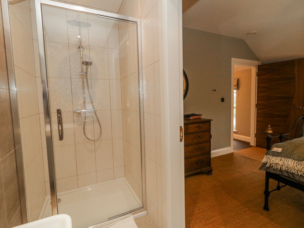 A shower enclosure in a bathroom at Cloneytrace Mines in Broughshane