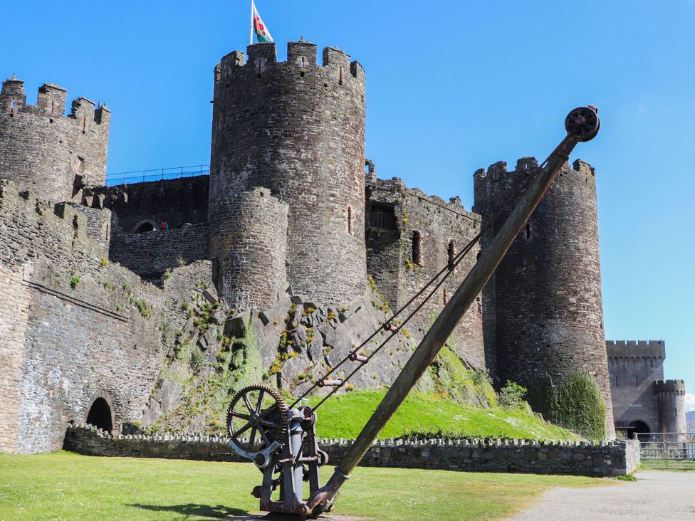 A castle with towers and a catapult at Pen Glorian in Conwy