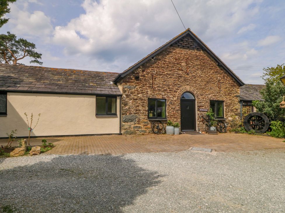 An exterior view of a stone building at Pen Glorian in Conwy