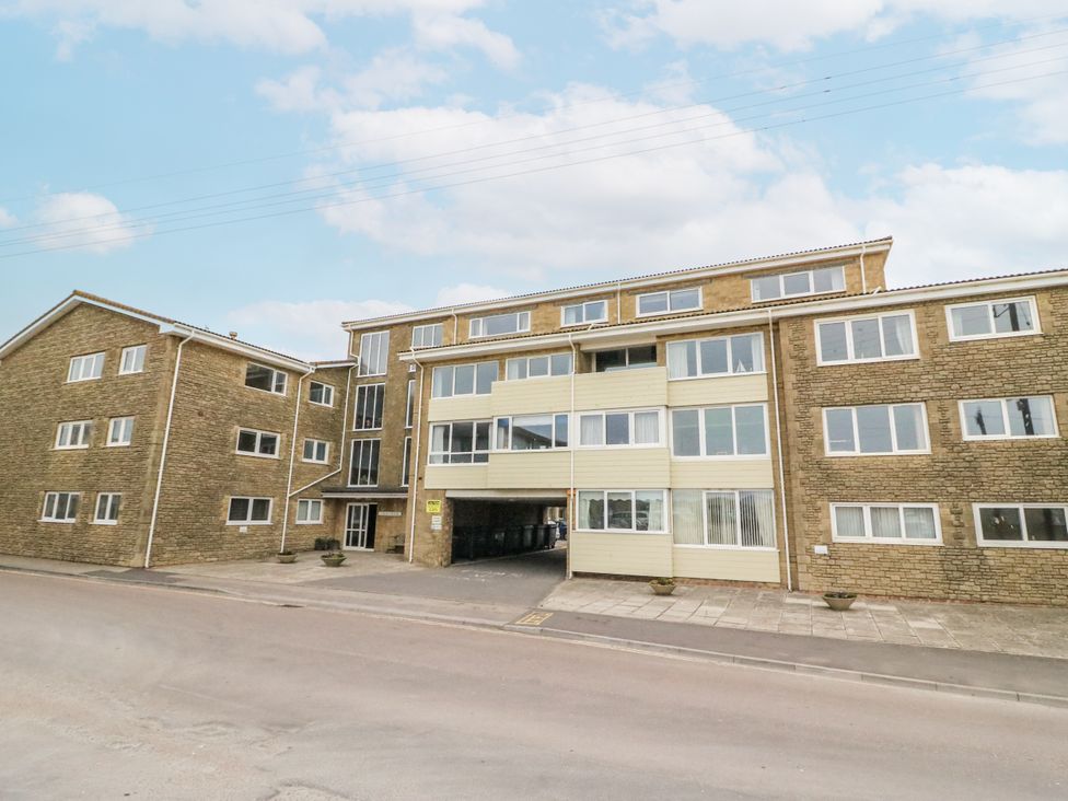 A building with multiple windows and an entrance at Flat 13, Chesil House Bridport