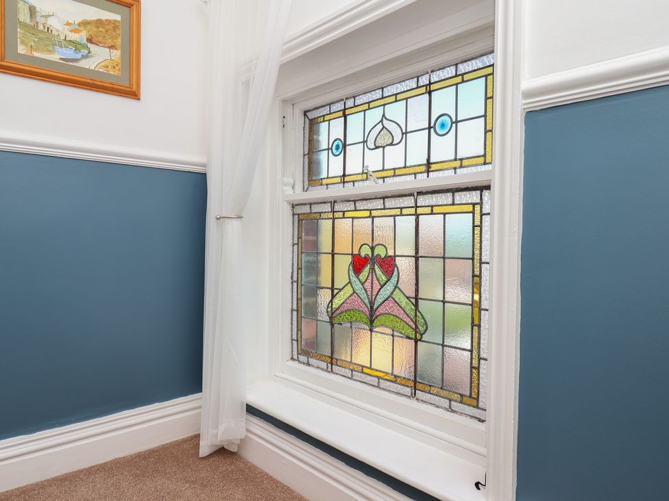 A stained glass window in a room at Kingfisher House Staithes