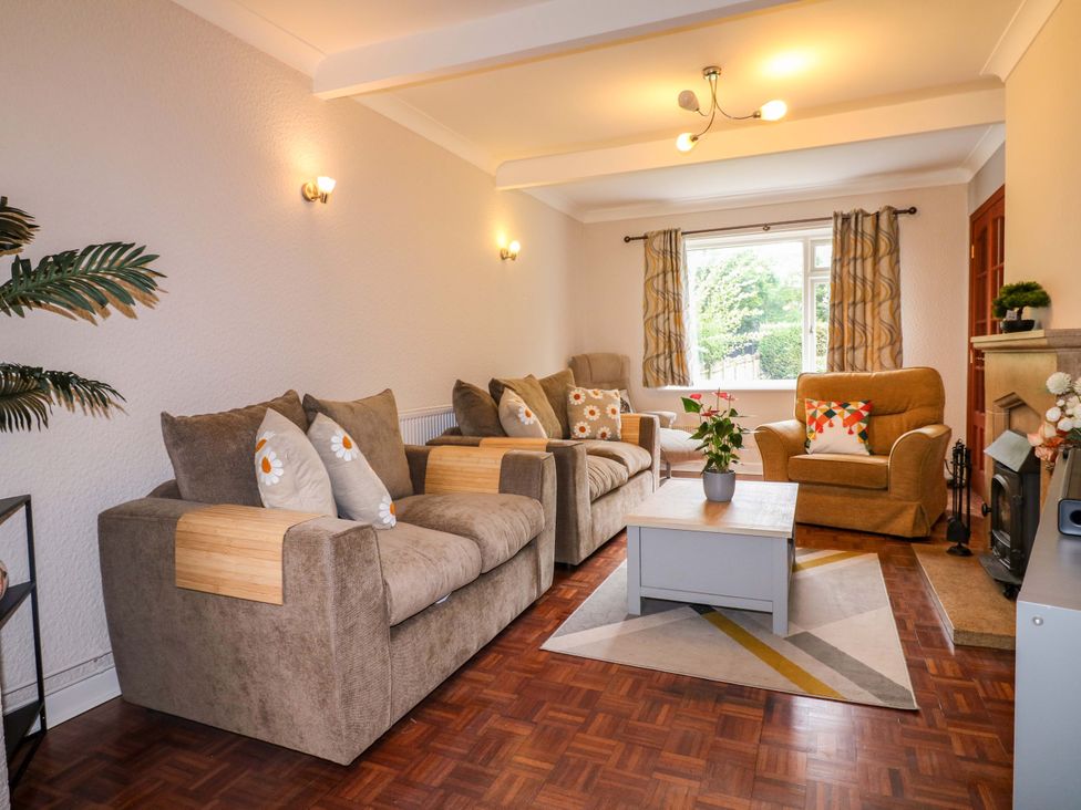 A living room with sofas and a coffee table at Oxcroft View in Oxcroft near Clowne