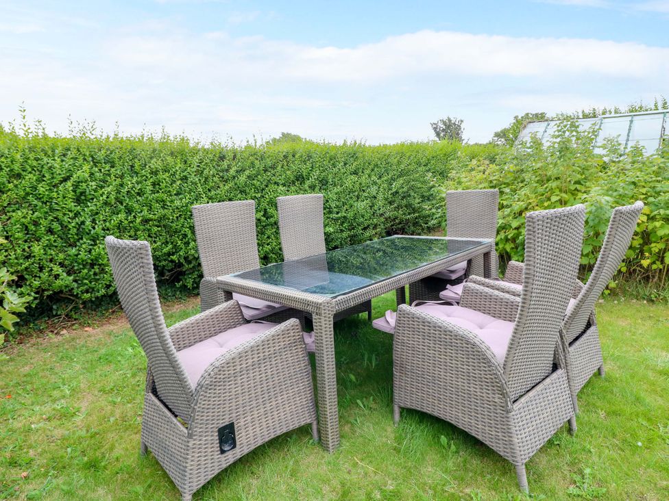 A table and chairs in a garden at Oxcroft View Oxcroft near Bolsover