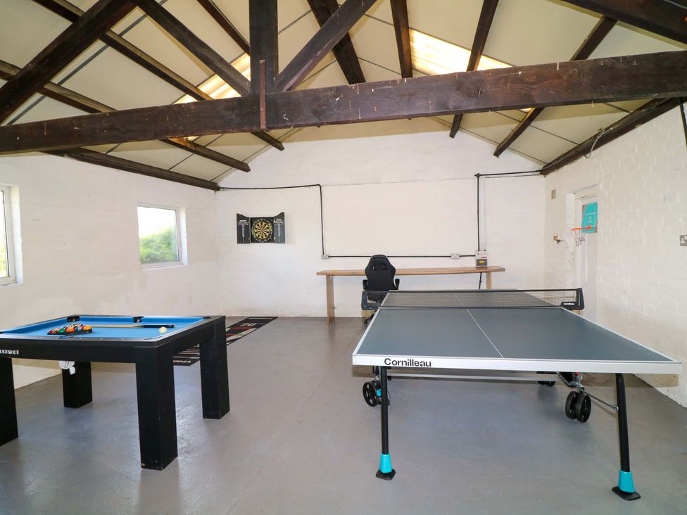 A game room with a pool table and a ping pong table at Oxcroft View near Bolsover