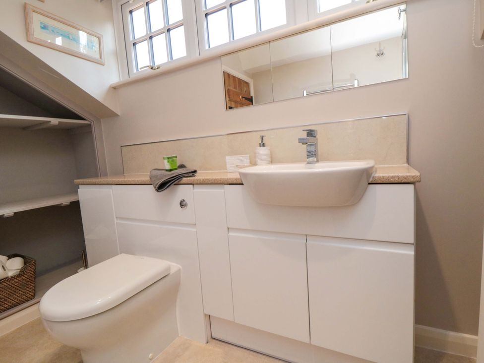 A bathroom with a sink and toilet at Spring Cottage in York