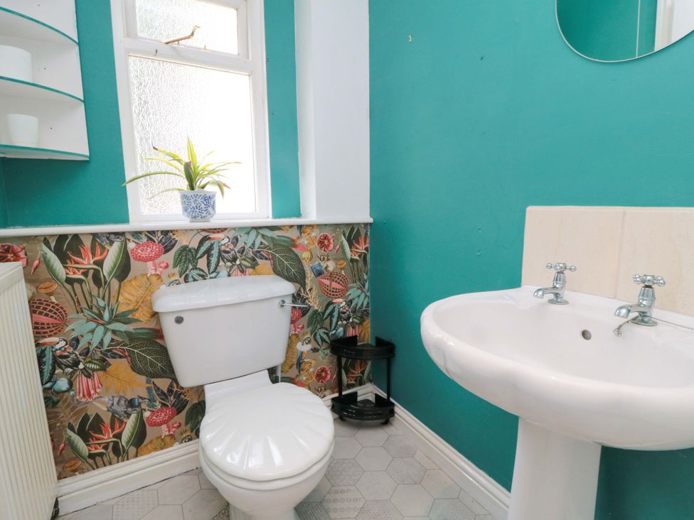 A bathroom with a toilet and sink at The Annex in York