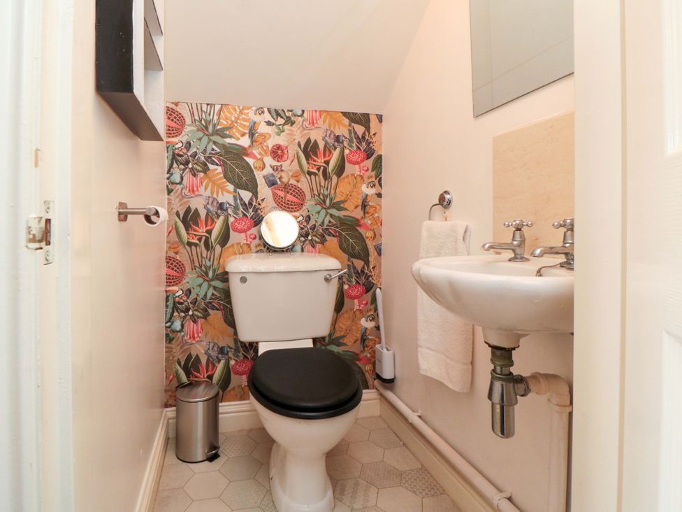 A bathroom with a toilet and sink at The Annex in York